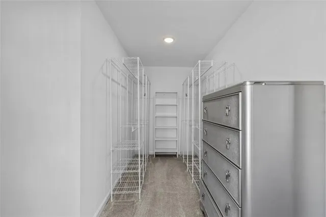 a bathroom with a shower curtain and a bathtub