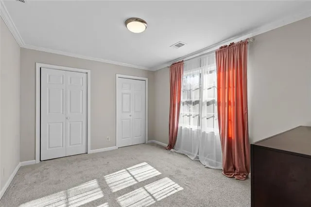 a view of a chair and fire pit in the backyard