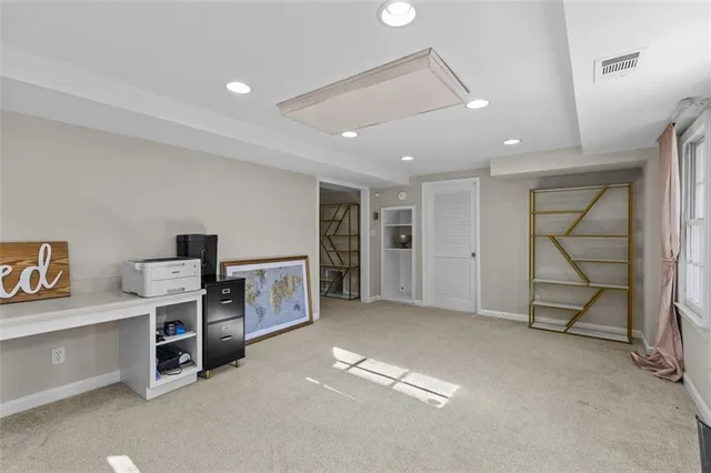 a view of a house with backyard porch and sitting area