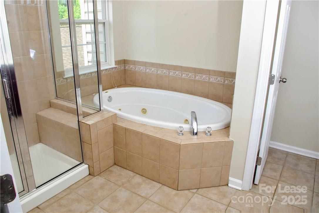 8339 Viewpoint Lane Cornelius, NC 28031 - Photo 17 of 30 a bathroom with a bathtub