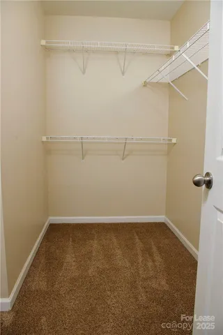 a view of a room with racks on the wall