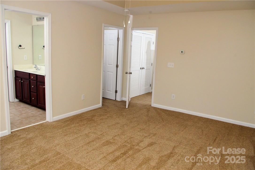 8339 Viewpoint Lane Cornelius, NC 28031 - Photo 21 of 30 an empty room with closet area
