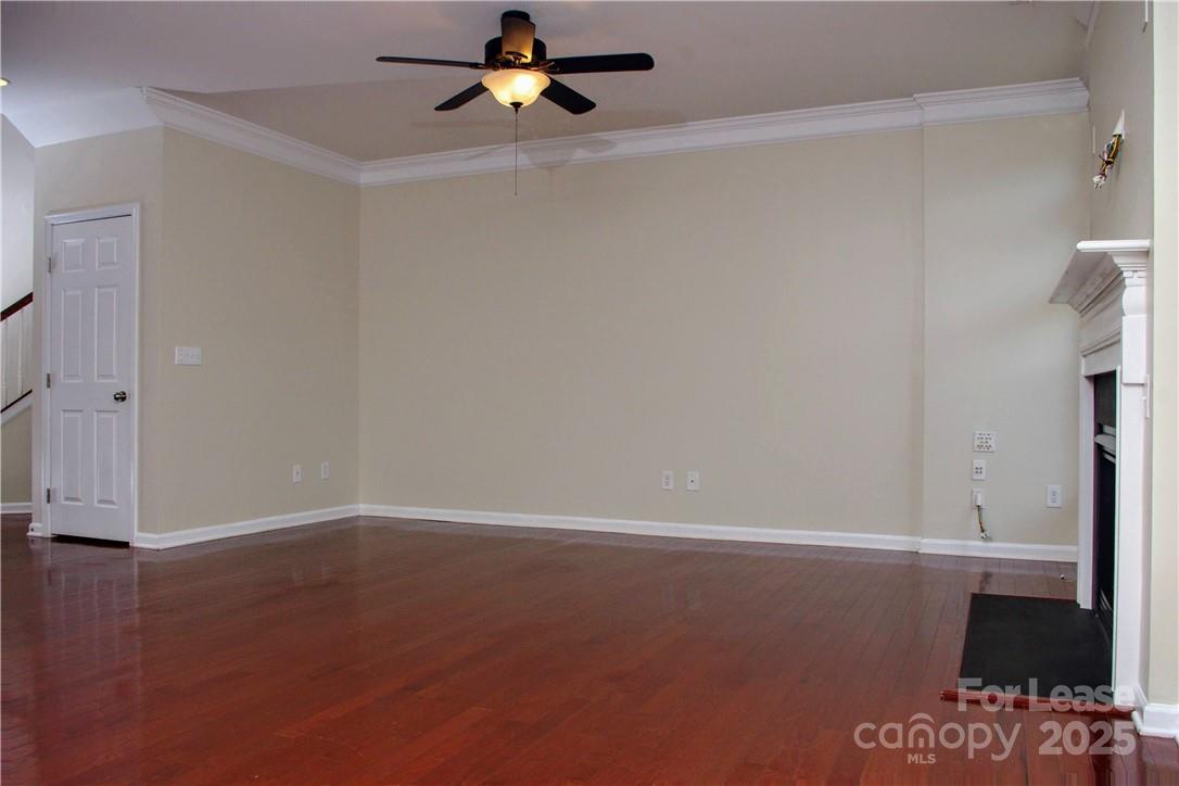 8339 Viewpoint Lane Cornelius, NC 28031 - Photo 9 of 30 wooden floor in an empty room
