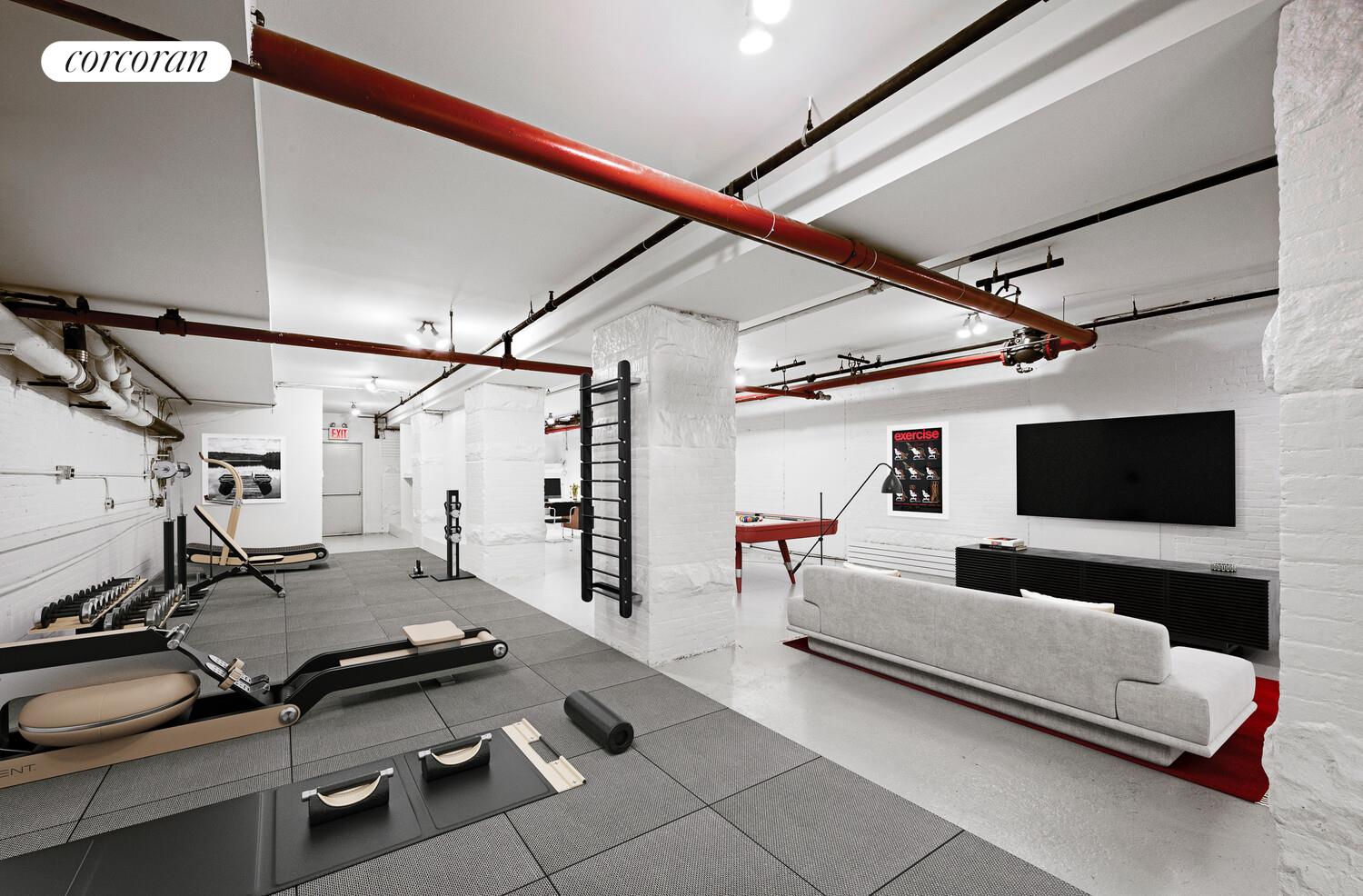 125 Watts Street, Unit 1 Manhattan, NY 10013 - Photo 14 of 18 a living room with furniture and a flat screen tv