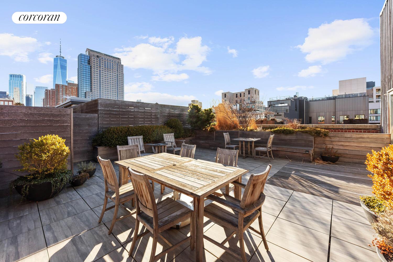 125 Watts Street, Unit 1 Manhattan, NY 10013 - Photo 15 of 18 a view of a terrace with furniture and a table