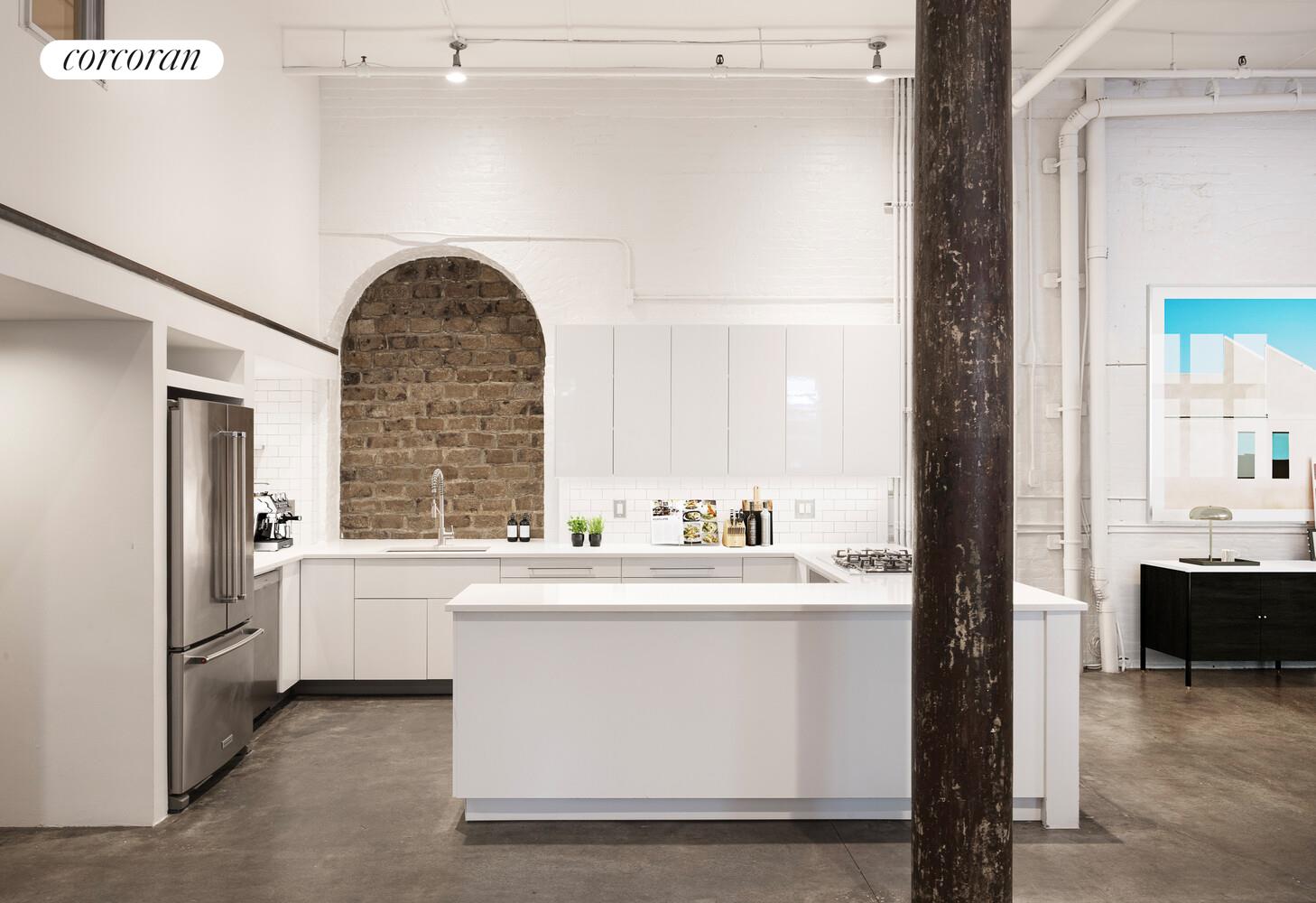 125 Watts Street, Unit 1 Manhattan, NY 10013 - Photo 4 of 18 a kitchen with a sink cabinets and window