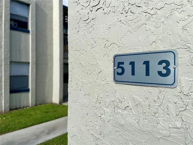 a sign that is on the side of a building