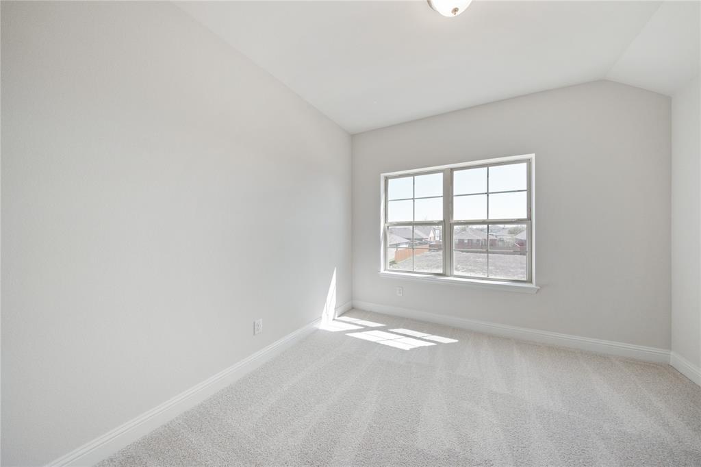 116 Old Glory Lane Forney, TX 75126 - Photo 5 of 23 an empty room with a window