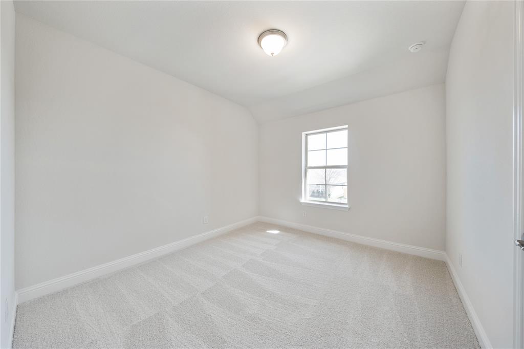 116 Old Glory Lane Forney, TX 75126 - Photo 6 of 23 an empty room with a window
