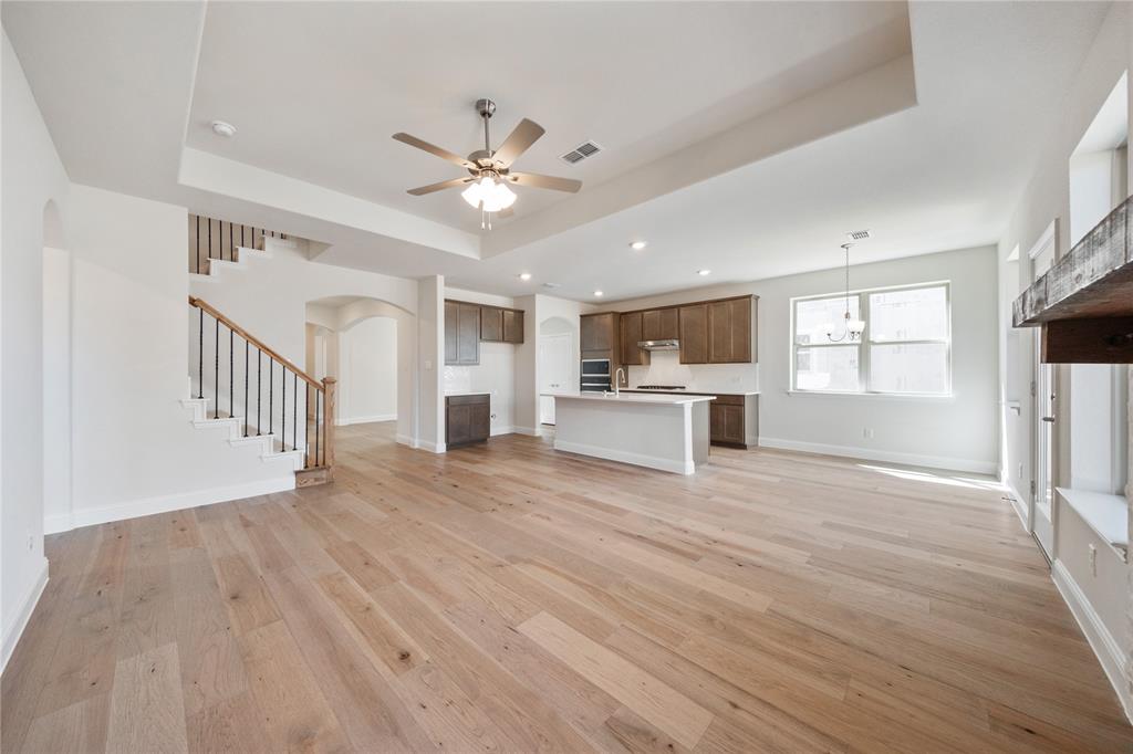 116 Old Glory Lane Forney, TX 75126 - Photo 10 of 23 a view of kitchen with sink and wooden floor