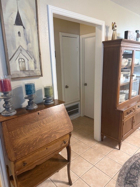 2402 Sycamore Avenue, Unit E3 Huntsville, TX 77340 - Photo 17 of 38 a bedroom with a bed and cabinets