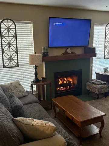 a bedroom with a bed and a mirror