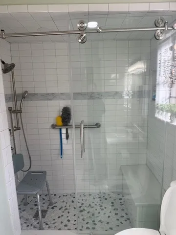 a bed room with a bed and a chandelier