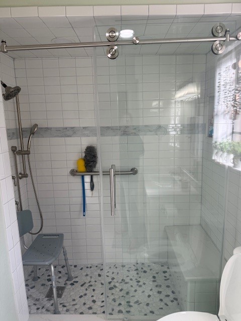 2402 Sycamore Avenue, Unit E3 Huntsville, TX 77340 - Photo 29 of 38 a bathroom with a shower