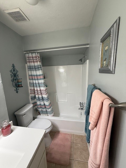 2402 Sycamore Avenue, Unit E3 Huntsville, TX 77340 - Photo 37 of 38 a bathroom with a sink a toilet and shower