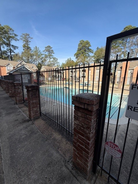 2402 Sycamore Avenue, Unit E3 Huntsville, TX 77340 - Photo 5 of 38 a view of a balcony with an outdoor space