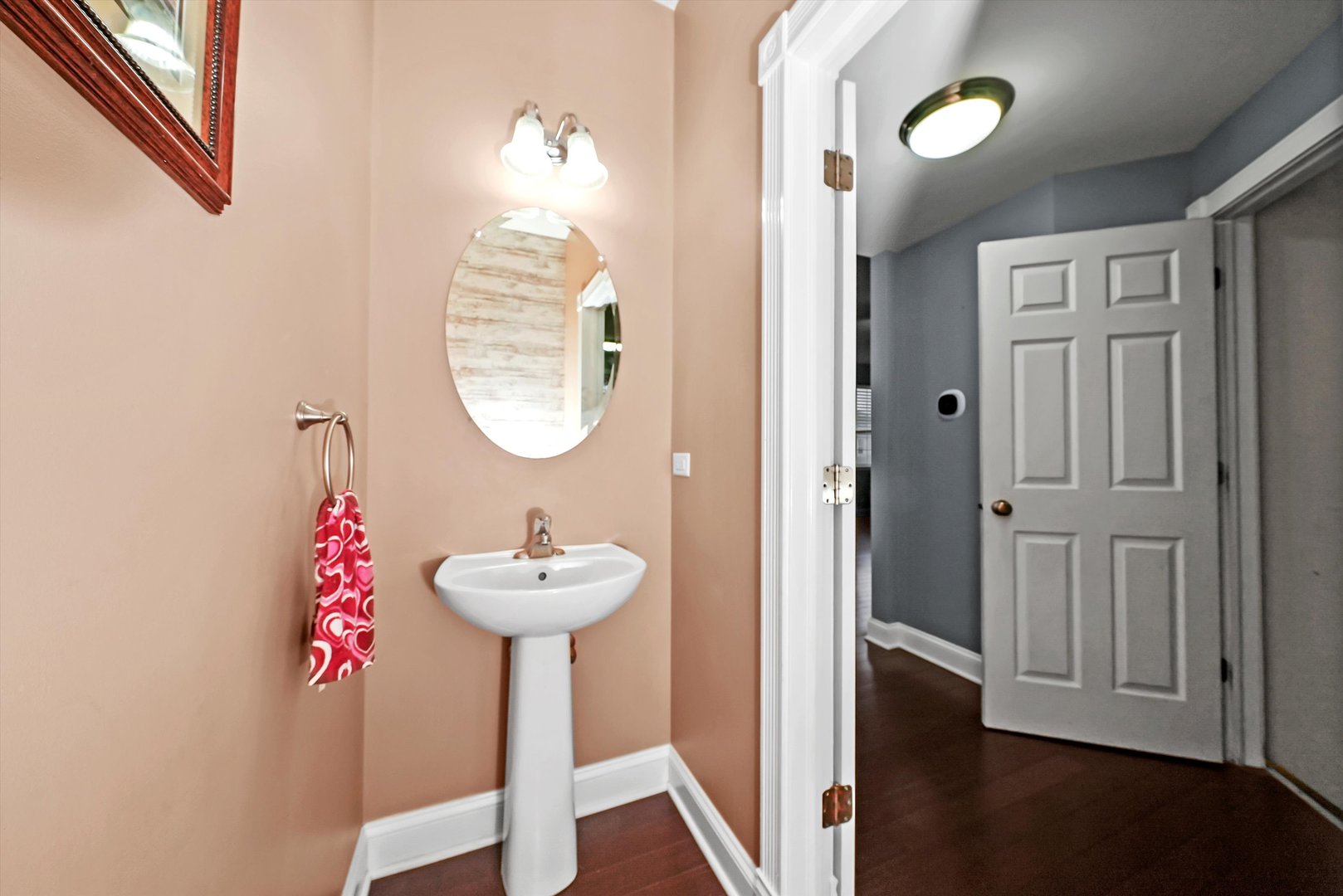 902 Farmstead Lane Shorewood, IL 60404 - Photo 16 of 35 a bathroom with a sink and a mirror