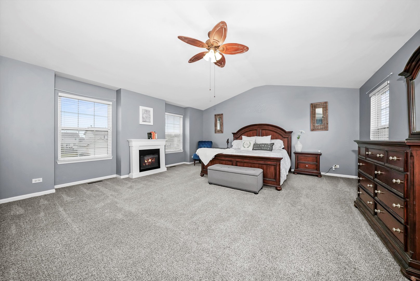 902 Farmstead Lane Shorewood, IL 60404 - Photo 18 of 35 a living room with furniture and a fireplace