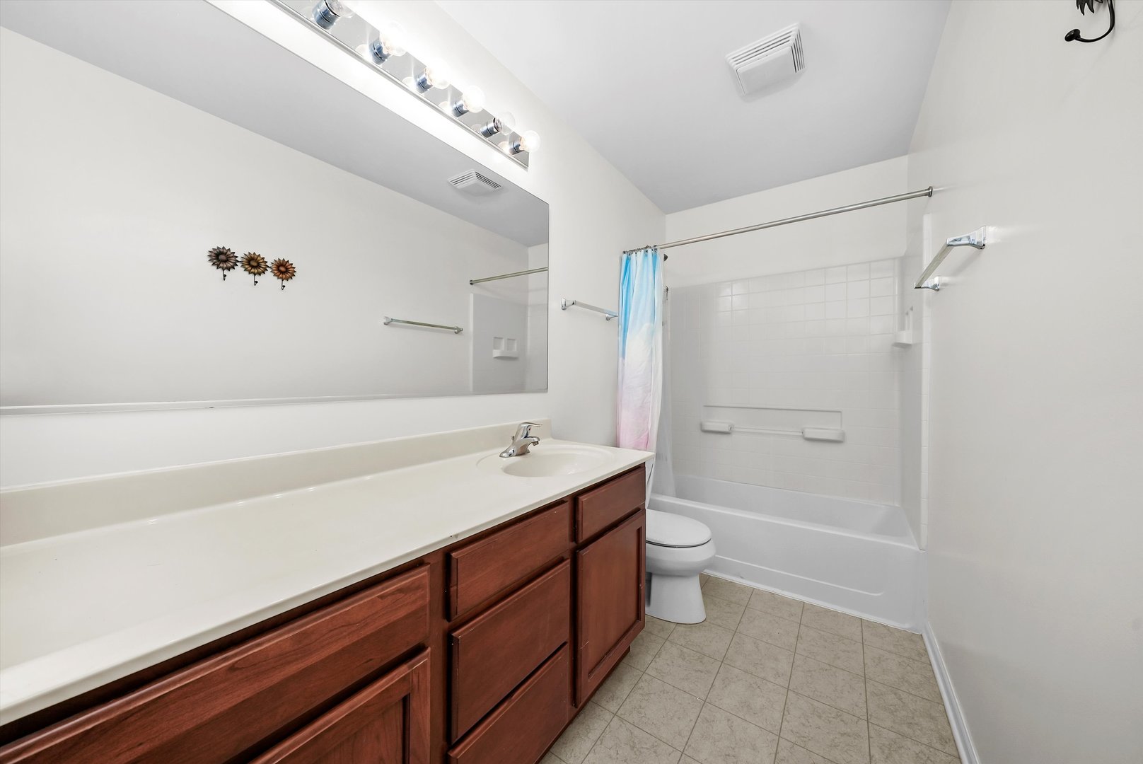 902 Farmstead Lane Shorewood, IL 60404 - Photo 24 of 35 a bathroom with a granite countertop sink a toilet and shower
