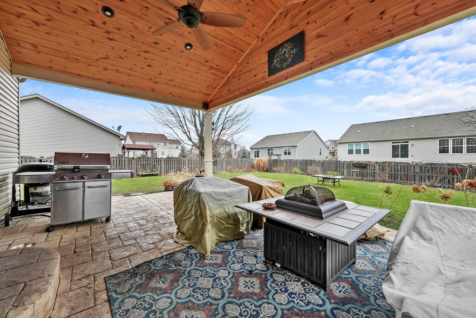 902 Farmstead Lane Shorewood, IL 60404 - Photo 25 of 35 a view of a dinning table and chair in the patio