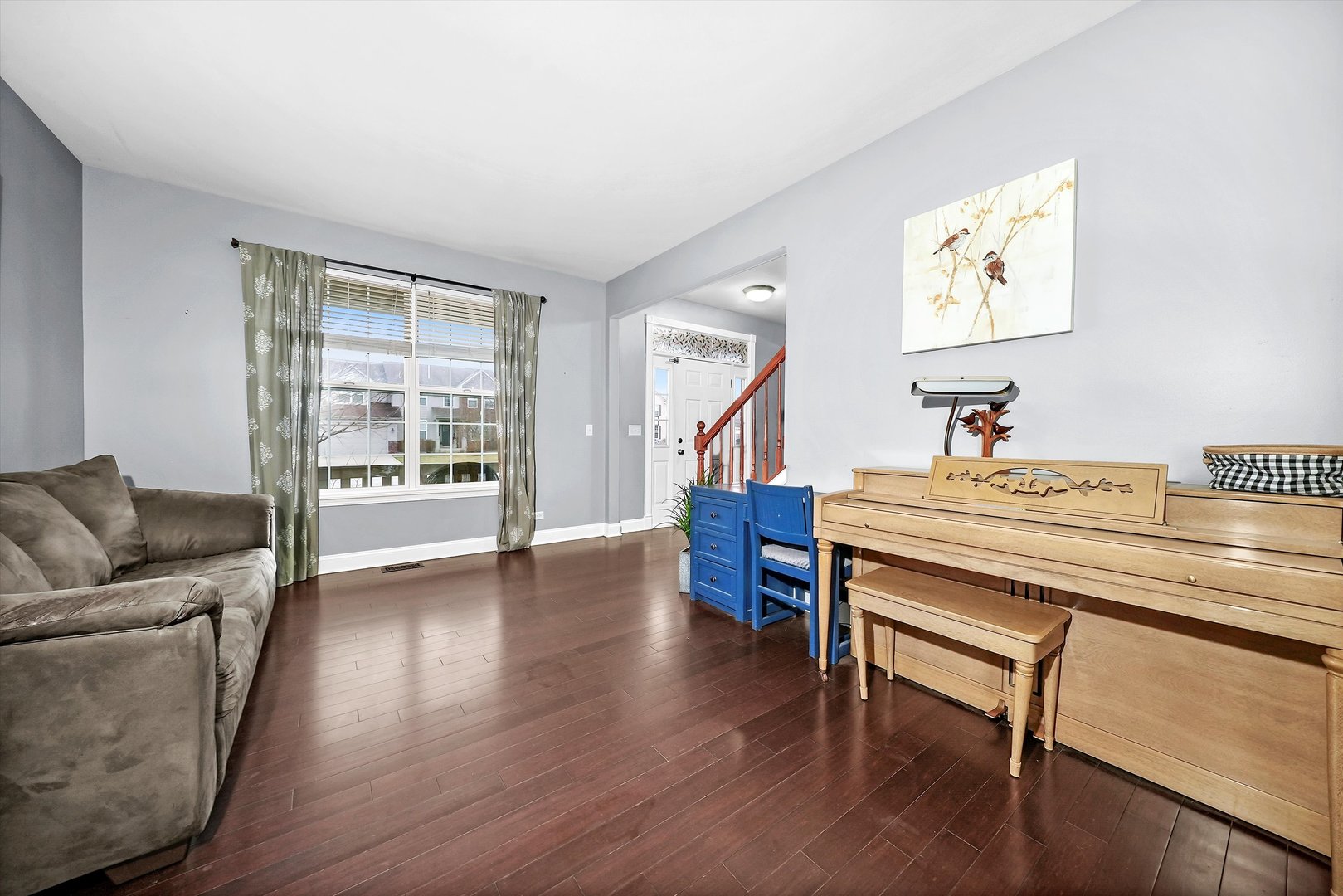902 Farmstead Lane Shorewood, IL 60404 - Photo 5 of 35 a living room with furniture and a wooden floor