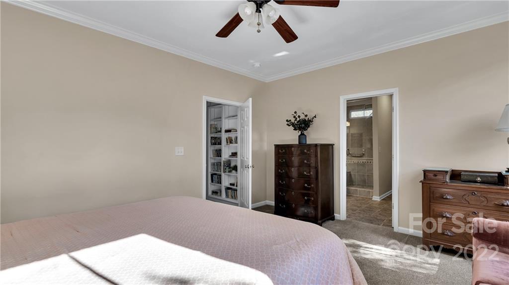 3221 Fifth Baxter Crossing Fort Mill, SC 29708 - Photo 19 of 30 a bedroom with a bed and a television