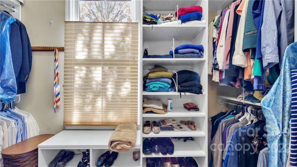 3221 Fifth Baxter Crossing Fort Mill, SC 29708 - Photo 22 of 30 a view of walk in closet with clothes and shoes