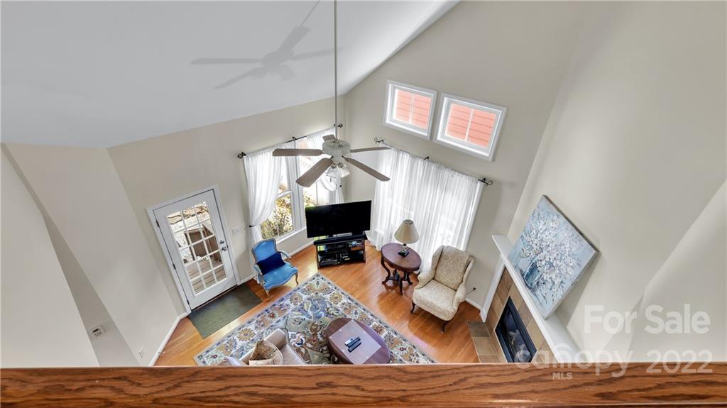 3221 Fifth Baxter Crossing Fort Mill, SC 29708 - Photo 25 of 30 a living room with furniture and a fireplace