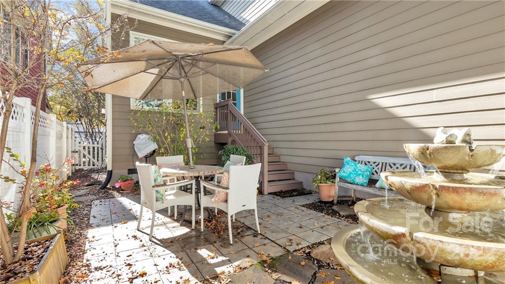 3221 Fifth Baxter Crossing Fort Mill, SC 29708 - Photo 28 of 30 a patio with table and chairs and potted plants