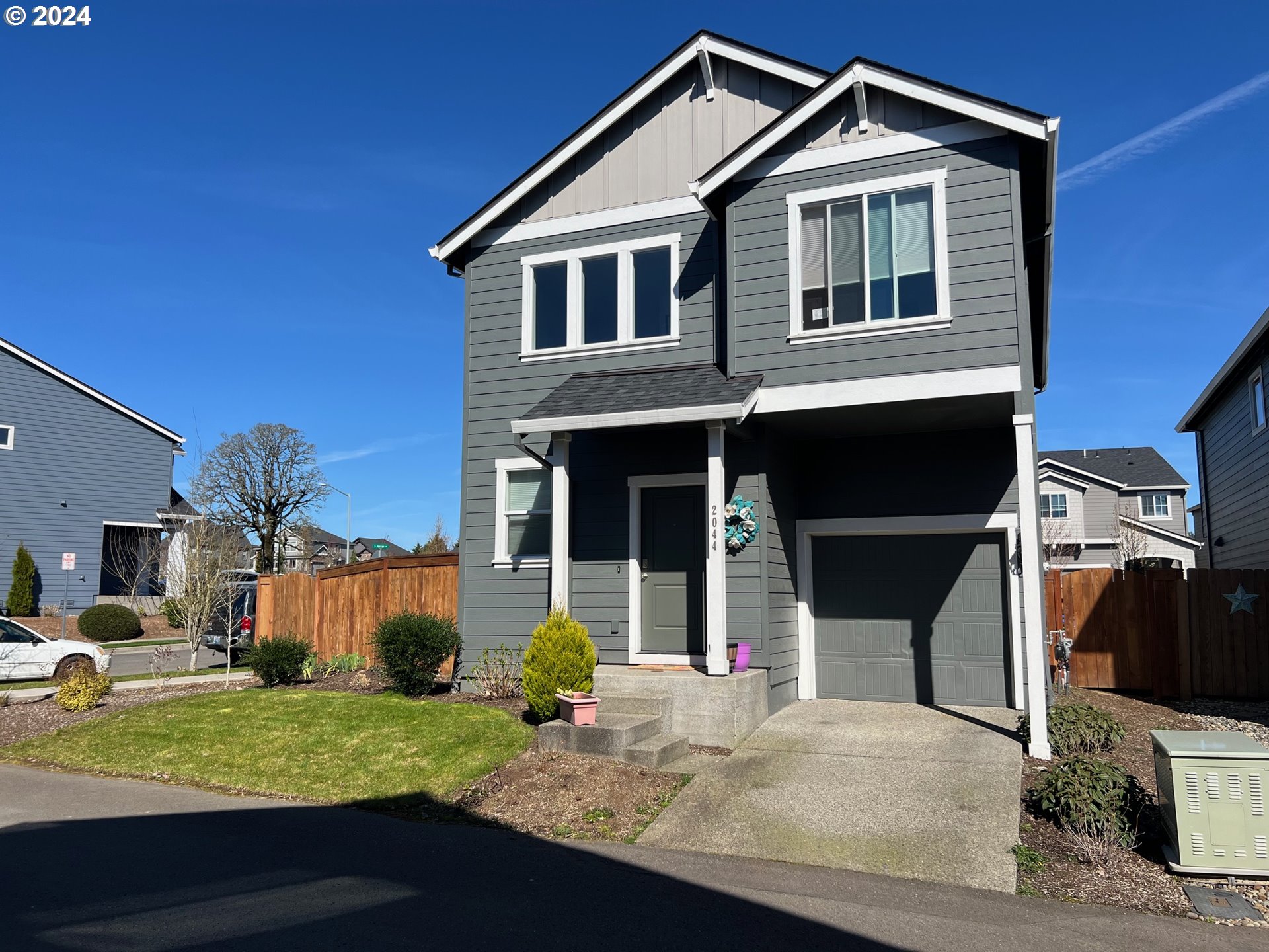 2044 South Chukar Drive Ridgefield, WA 98642 - Photo 1 of 16 a front view of a house with a yard