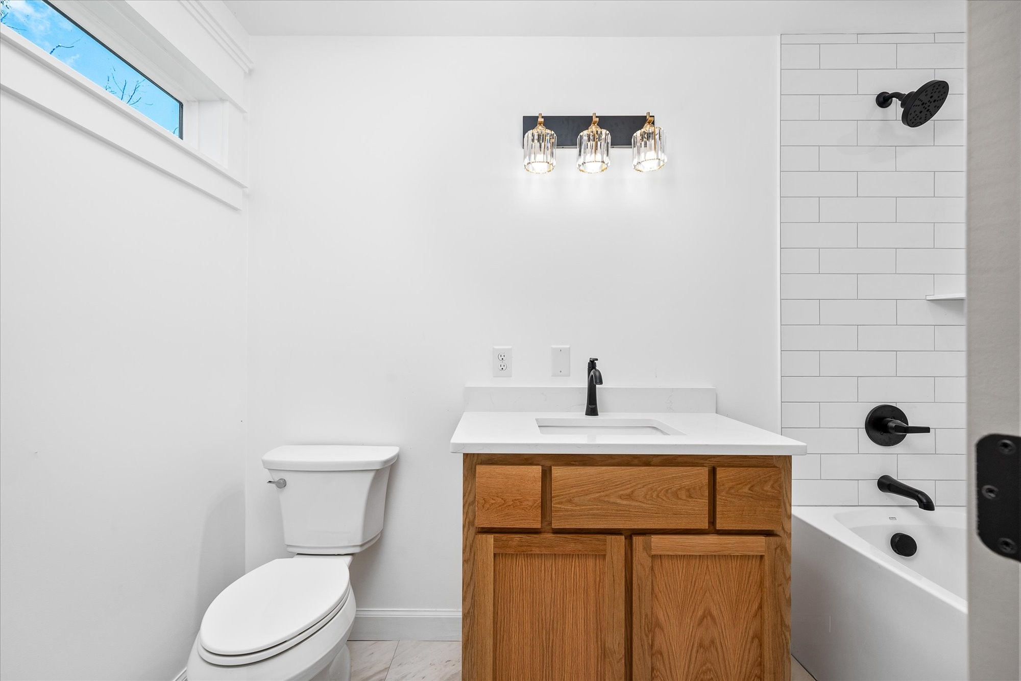 806 Robinson Ridge Road Baxter, TN 38544 - Photo 15 of 29 a bathroom with a granite countertop sink a toilet and mirror
