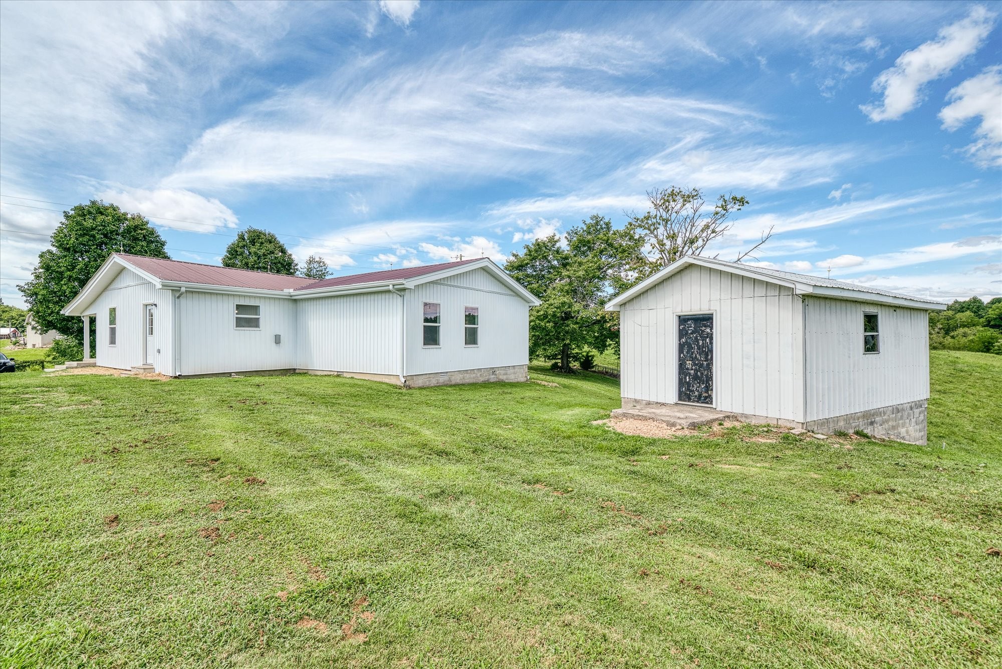 806 Robinson Ridge Road Baxter, TN 38544 - Photo 23 of 29 a view of a house with a backyard