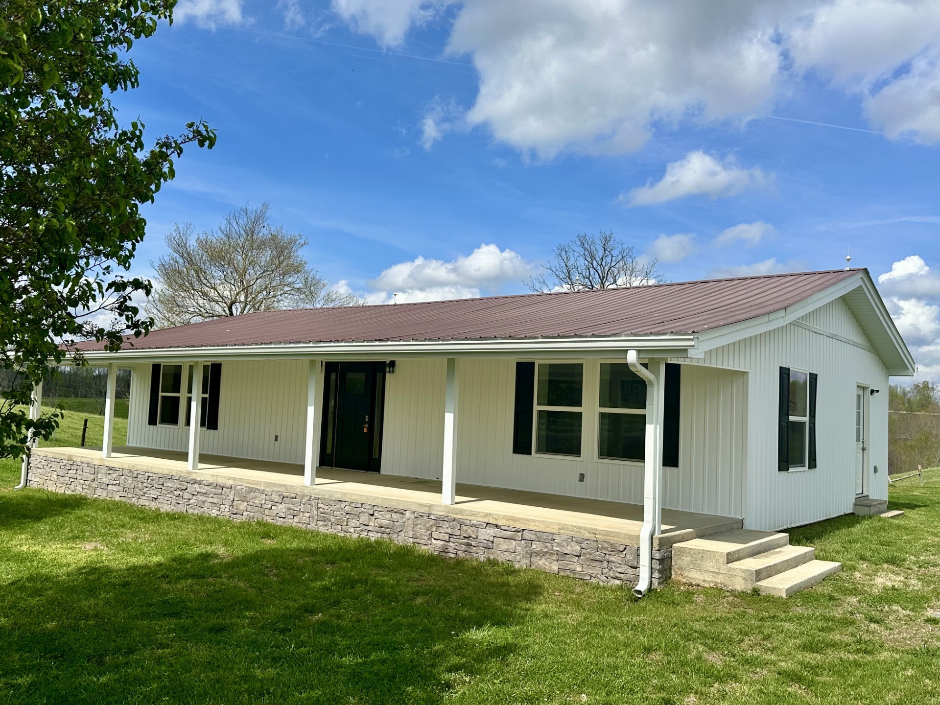 806 Robinson Ridge Road Baxter, TN 38544 - Photo 29 of 29 a view of a house with a yard