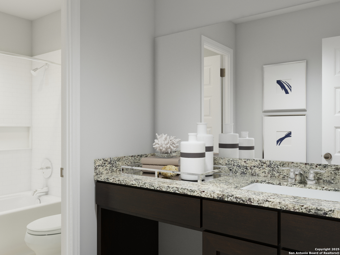 8538 Catnip Pass Elmendorf, TX 78112 - Photo 33 of 35 a bathroom with a granite countertop sink and a toilet