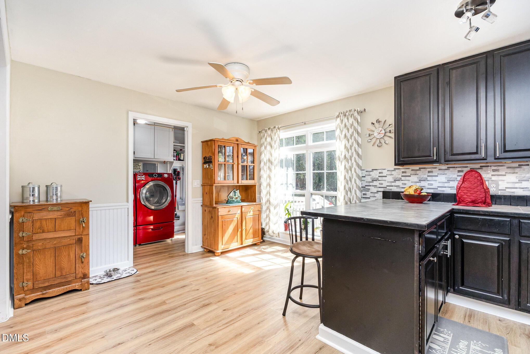365 Landmark Road Willow Spring, NC 27592 - Photo 13 of 27 a view of a kitchen with stainless steel appliances granite countertop a stove and cabinets