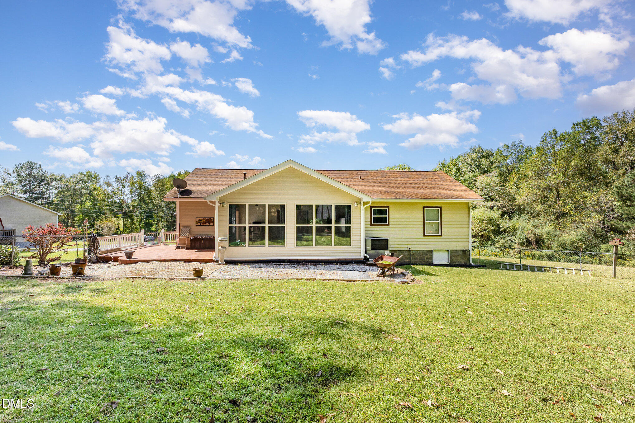 365 Landmark Road Willow Spring, NC 27592 - Photo 26 of 27 a view of a house with a big yard and sitting area