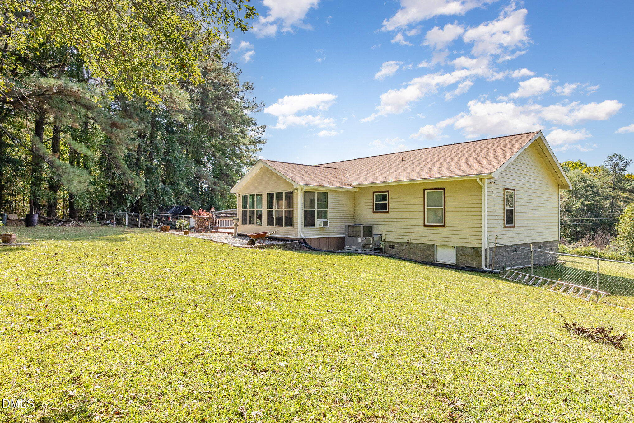 365 Landmark Road Willow Spring, NC 27592 - Photo 27 of 27 a front view of house with yard and swimming pool