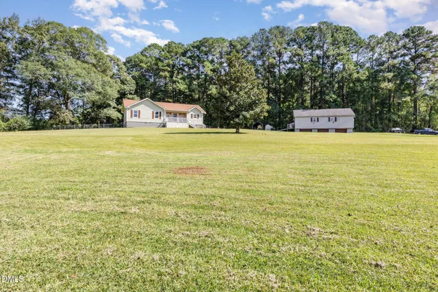 a view of an ocean and a yard