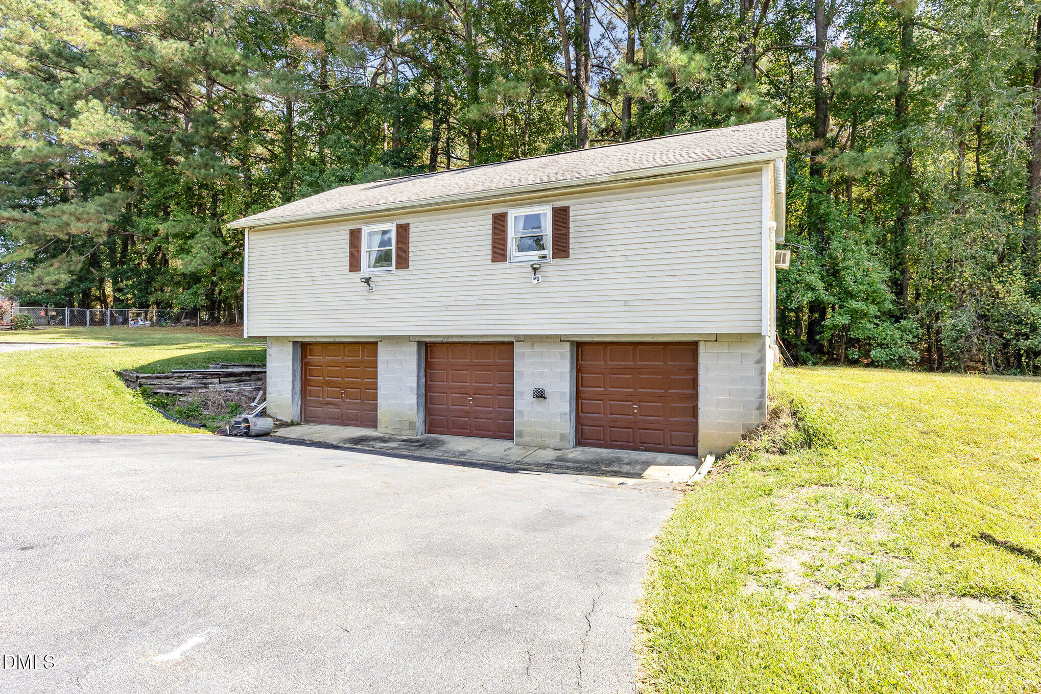 365 Landmark Road Willow Spring, NC 27592 - Photo 5 of 27 a front view of house with yard and trees in the background