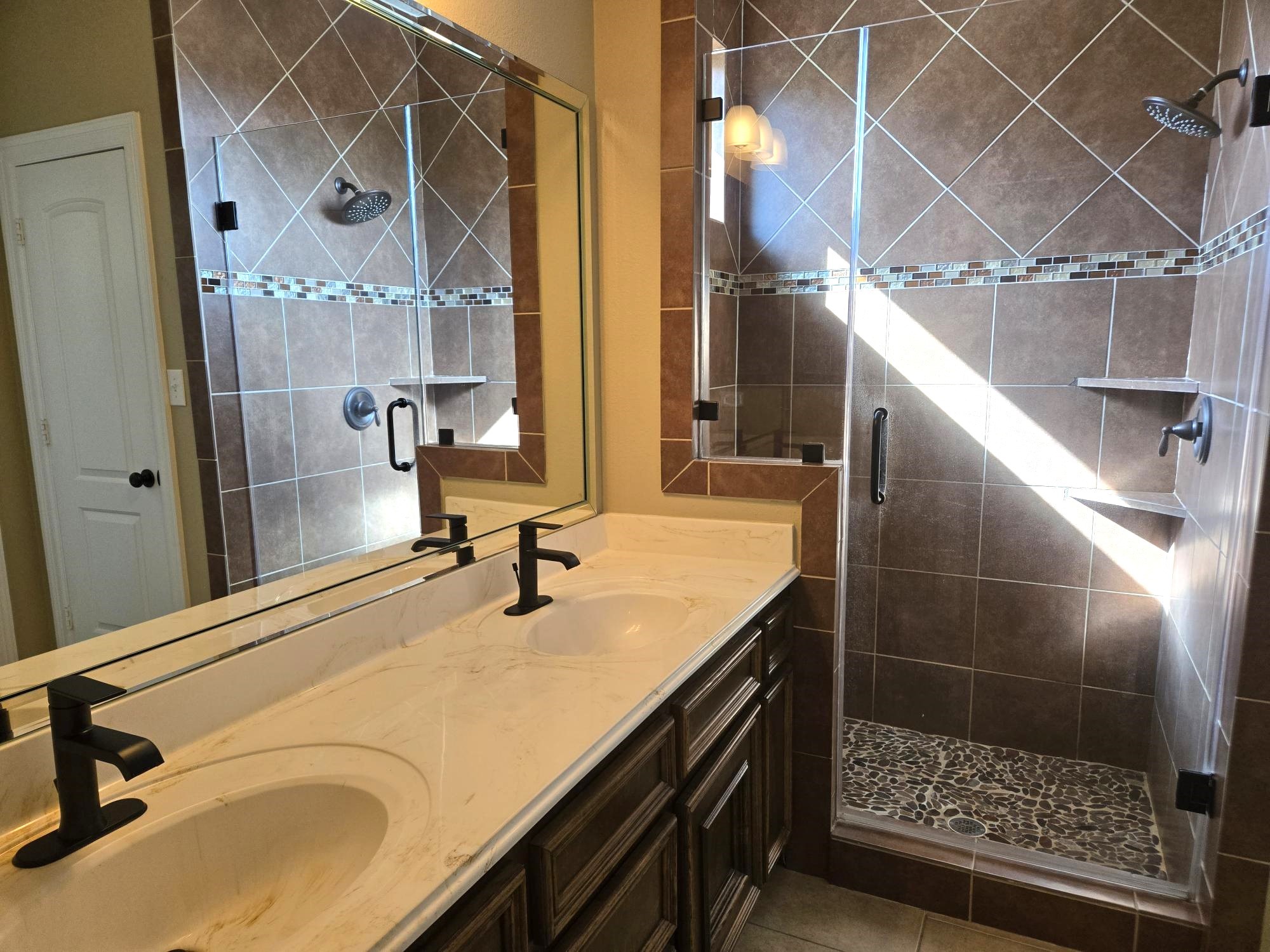 306 Masterson Street Arcola, TX 77583 - Photo 17 of 28 Primary Bathroom with Walk-in Shower.