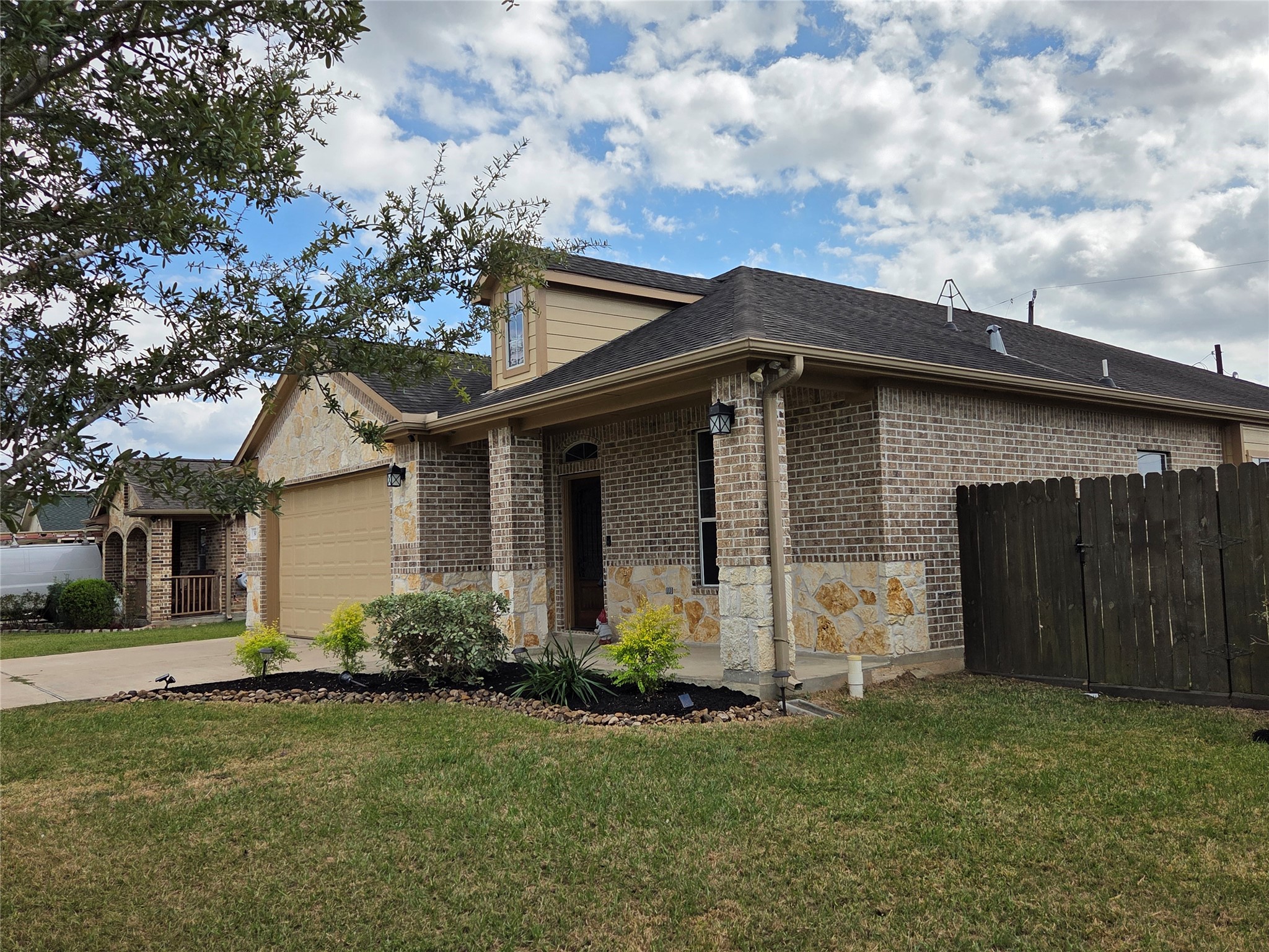 306 Masterson Street Arcola, TX 77583 - Photo 28 of 28 Side View of the front yard and Covered Porch.