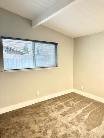 an empty room with cabinet