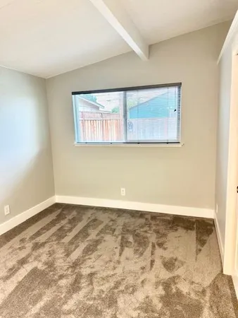 a view of a room with an empty space