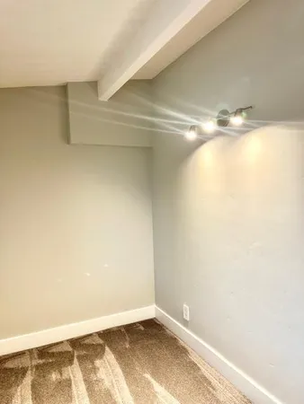 an empty room with a workspace