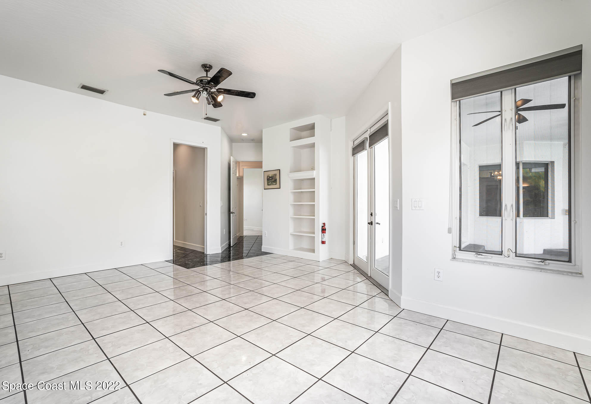 3920 Postridge Trail Melbourne, FL 32934 - Photo 12 of 52 a view of a livingroom with closet and window