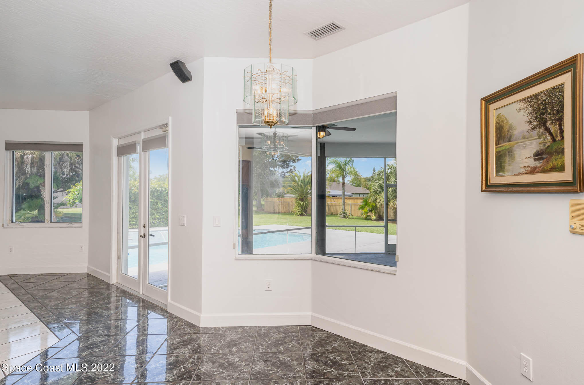 3920 Postridge Trail Melbourne, FL 32934 - Photo 20 of 52 a view of an empty room with a window