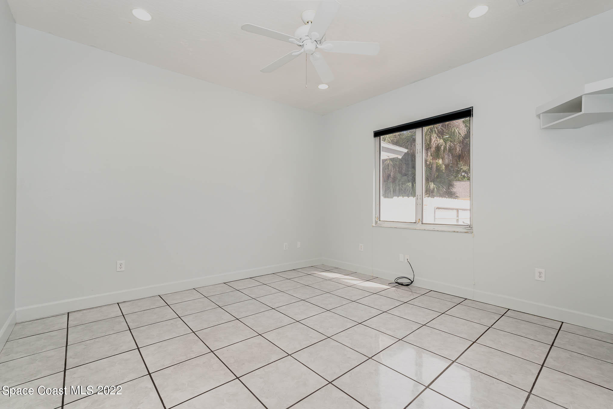3920 Postridge Trail Melbourne, FL 32934 - Photo 30 of 52 a view of an empty room and window