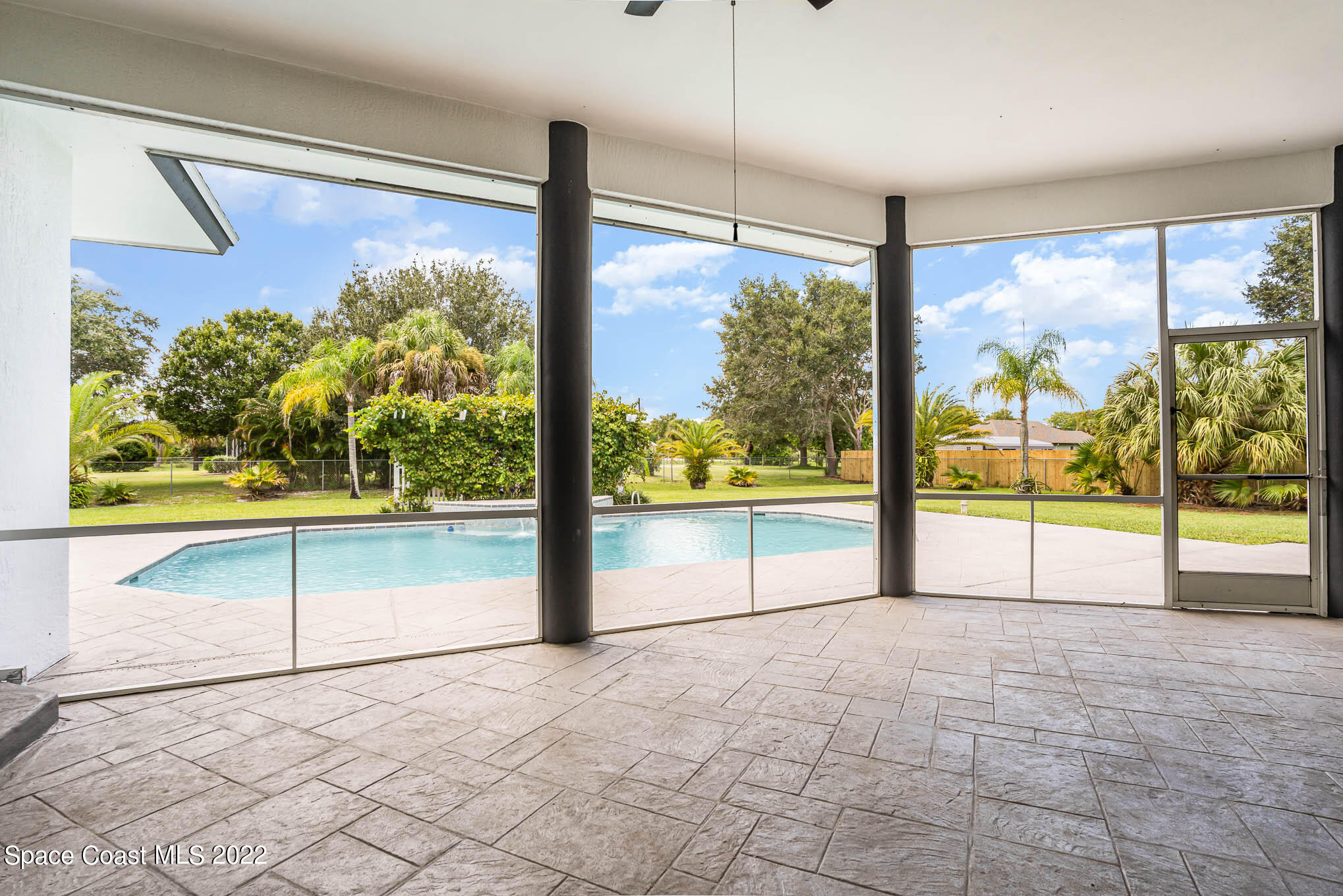 3920 Postridge Trail Melbourne, FL 32934 - Photo 35 of 52 a view of an empty room with a large window with living room
