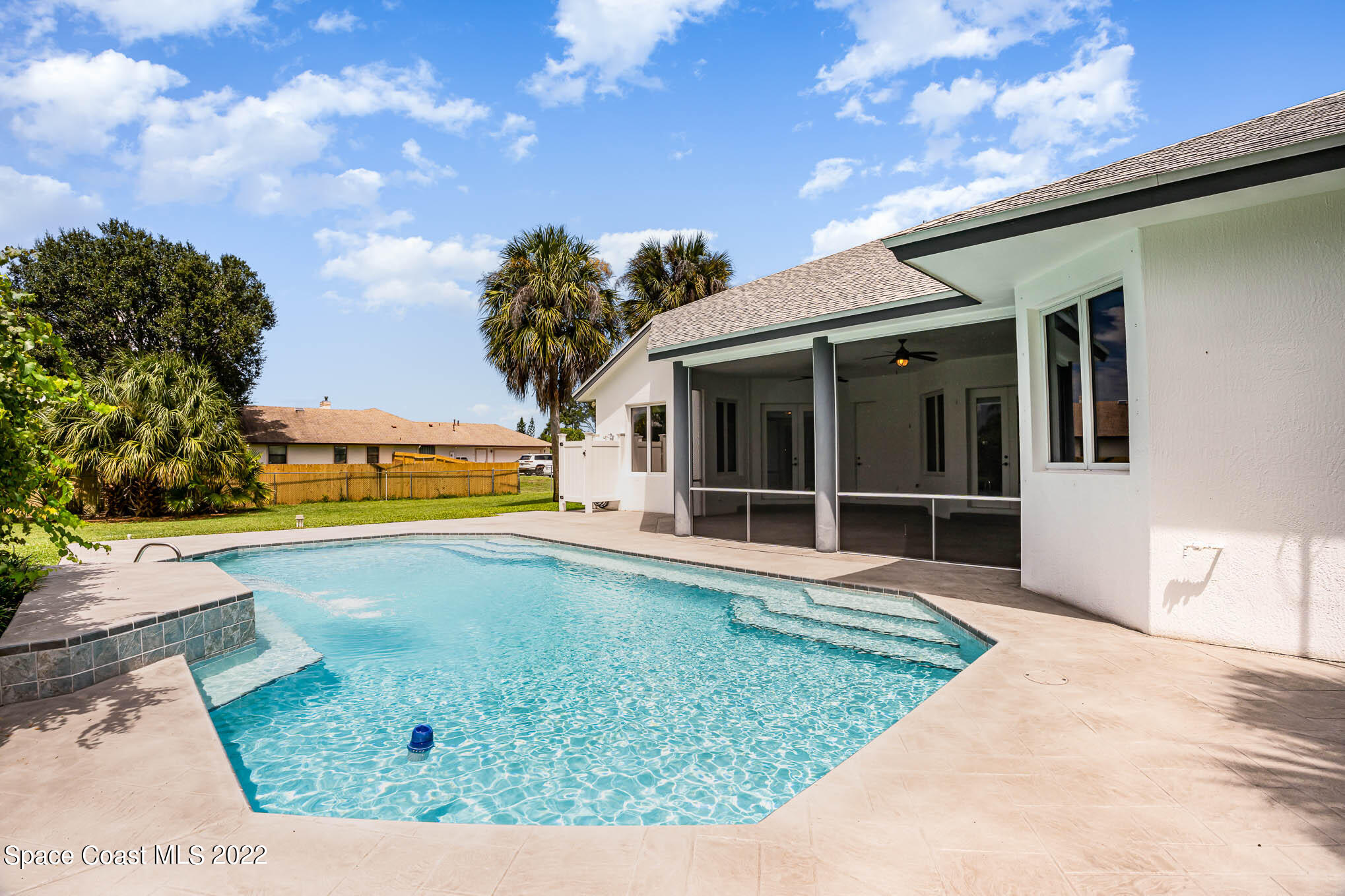 3920 Postridge Trail Melbourne, FL 32934 - Photo 37 of 52 a view of a house with swimming pool and sitting area