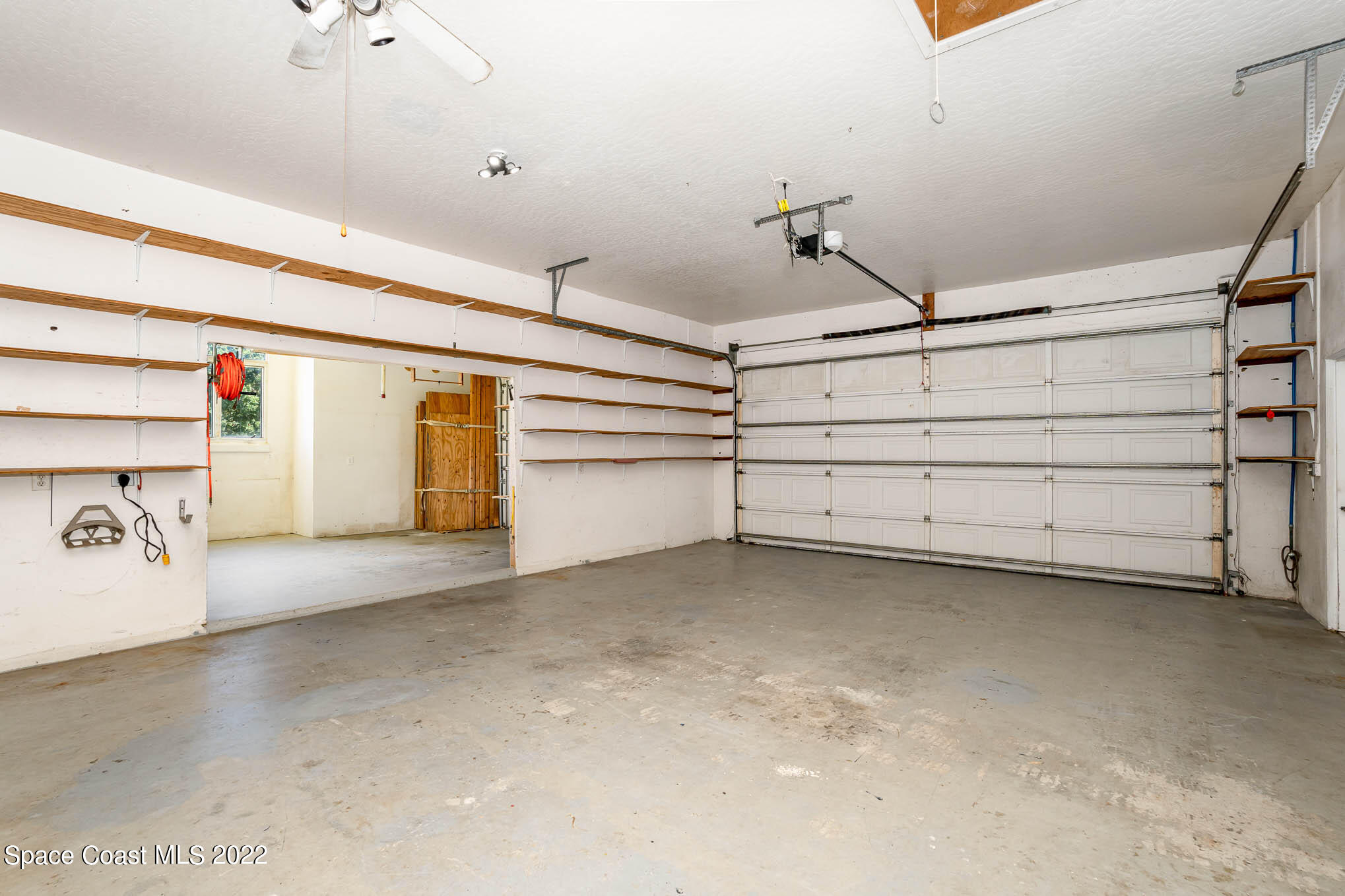 3920 Postridge Trail Melbourne, FL 32934 - Photo 42 of 52 a view of a room with storage